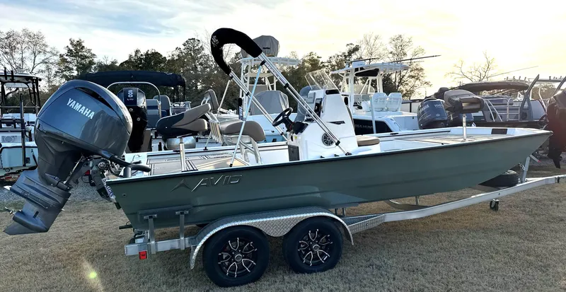 The Image of 2025 Avid Rogue 20 CC boat on trailer with Yamaha outboard motor. - 0