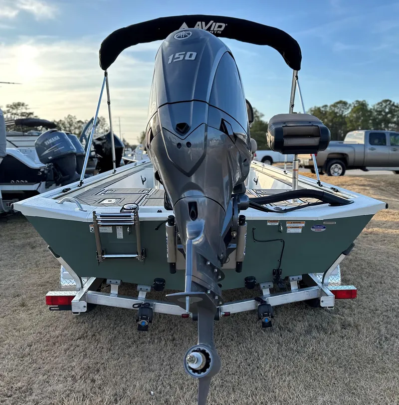 Slide: The Image of Avid Rogue 20 CC 2025 boat with 150 HP engine on trailer. - 9