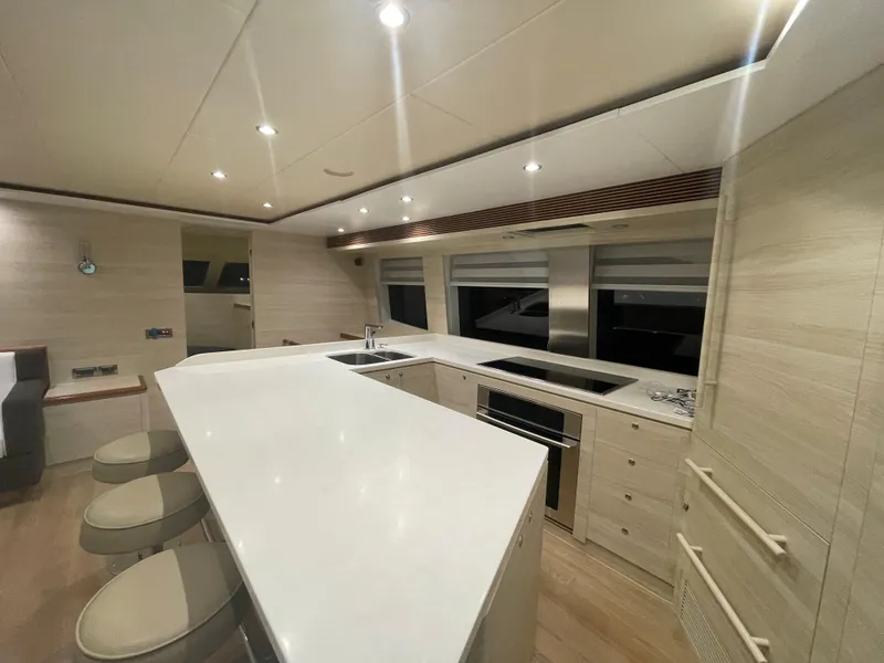 Slide: The Image of Luxurious kitchen interior of 2017 Horizon PC60 yacht with modern appliances and sleek design. - 7