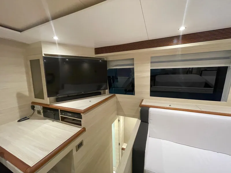 Slide: The Image of Modern interior of 2017 Horizon PC60 yacht with TV and seating area. - 8