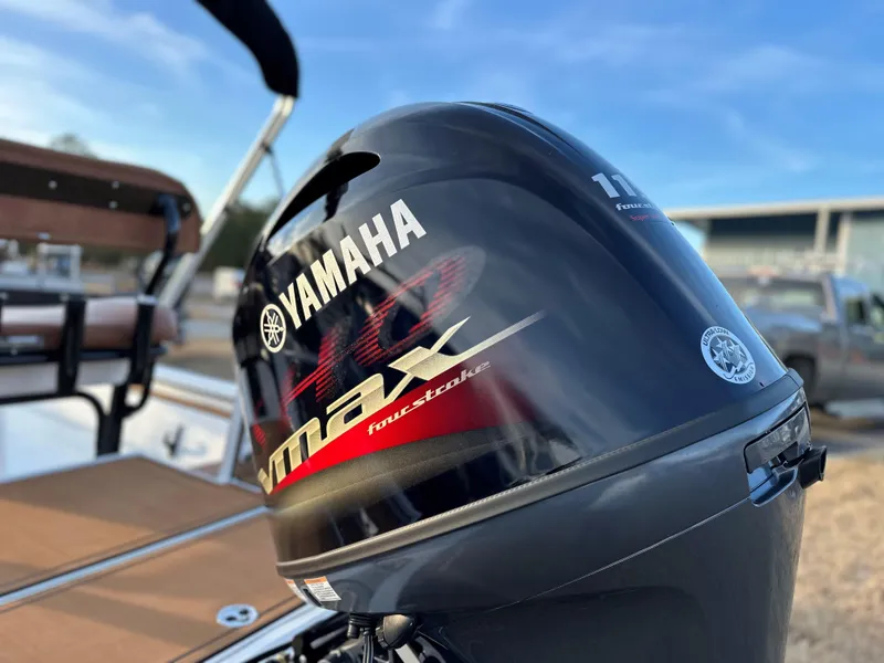 Slide: The Image of Yamaha VMAX outboard engine on 2025 Avid Rogue 20 CC boat, close-up view. - 13