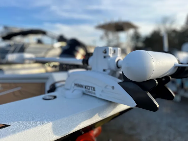 Slide: The Image of Close-up of a 2025 Avid Rogue 20 CC boat with Minn Kota trolling motor. - 15