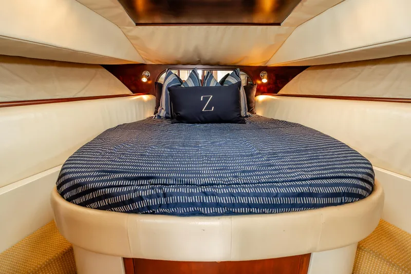 Slide: The Image of Luxurious 2006 Chris-Craft Roamer 40 yacht kitchen with wood cabinetry and modern appliances. - 18
