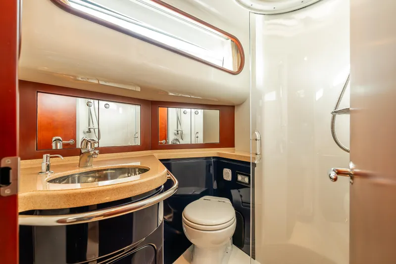 Slide: The Image of Luxurious interior of 2006 Chris-Craft Roamer 40 yacht with elegant seating and wooden finishes. - 20