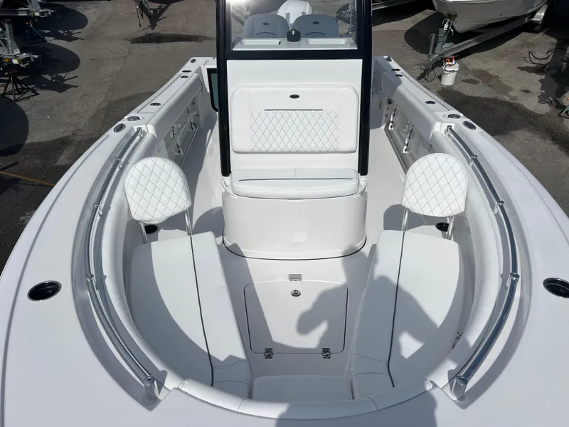 Slide: The Image of 2025 Sportsman Open 212 Center Console boat interior with seating and storage compartments. - 14