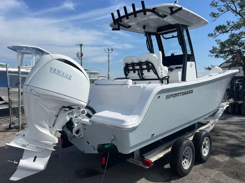 Slide: The Image of 2025 Sportsman Open 212 Center Console boat with Yamaha engine on trailer. - 4