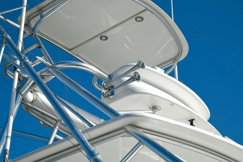 Slide: The Image of 2007 Cabo 40 Express with Tower, viewed from below against a clear blue sky. - 33