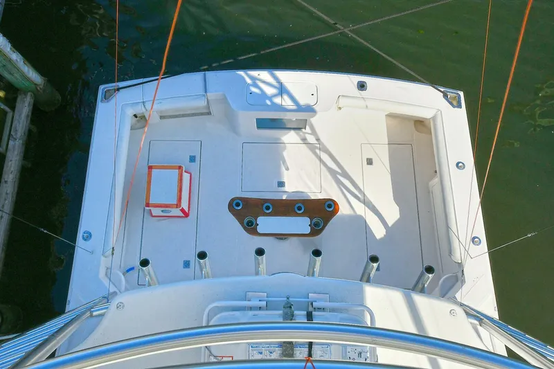 Slide: The Image of 2007 Cabo 40 Express with Tower, featuring metallic logo on white surface. - 35