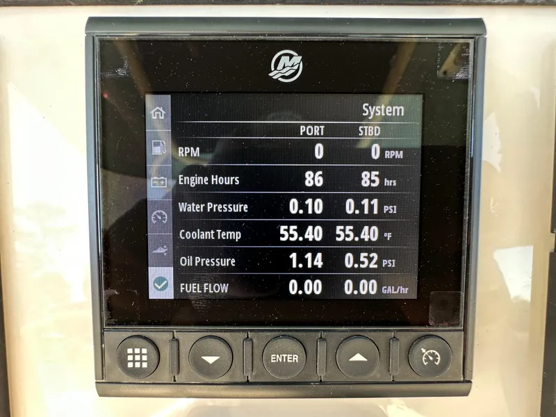 Slide: The Image of Display panel of a 2023 Boston Whaler 280 Outrage showing engine metrics. - 18