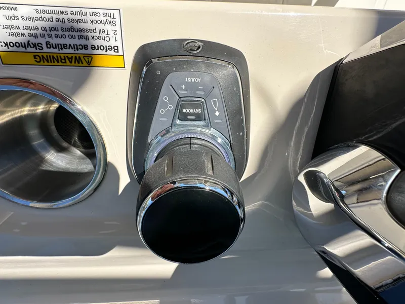 Slide: The Image of 2023 Boston Whaler 280 Outrage joystick control on boat dashboard. - 22