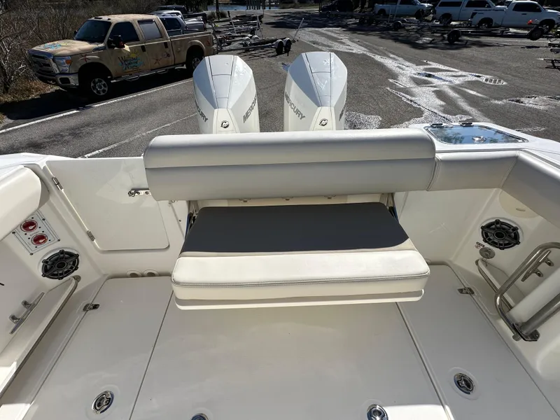 Slide: The Image of 2023 Boston Whaler 280 Outrage boat with dual Mercury engines and rear seating. - 35