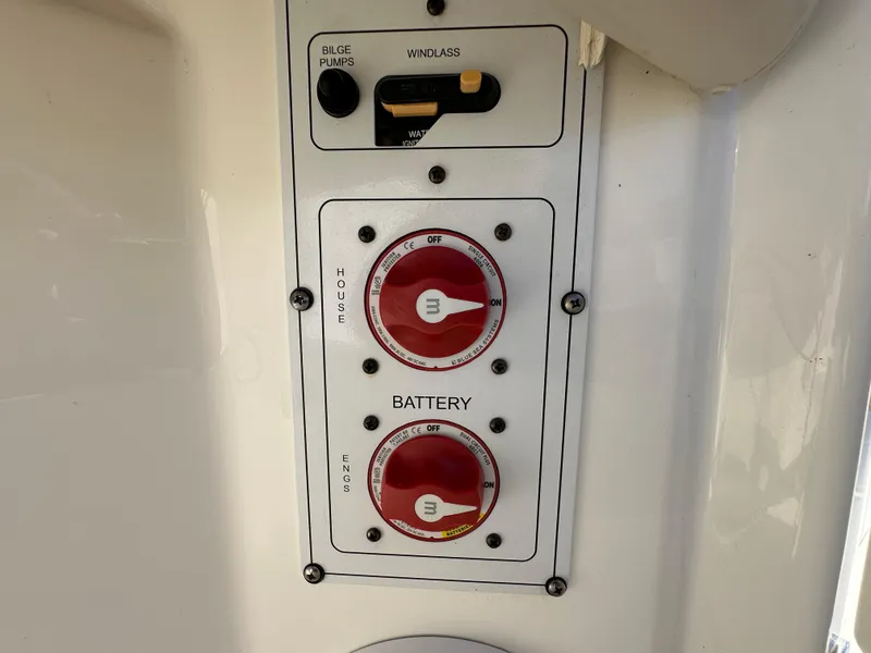 Slide: The Image of Control panel of 2023 Boston Whaler 280 Outrage boat with battery switches. - 45