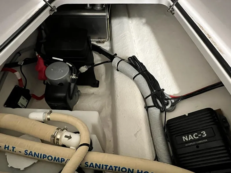 Slide: The Image of 2022 Axopar 28 CABIN interior wiring and components, featuring NAC-3 autopilot controller. - 24