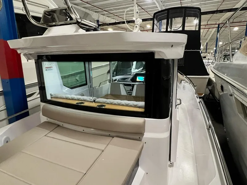 Slide: The Image of 2022 Axopar 28 CABIN boat interior, featuring sleek design and modern amenities. - 5