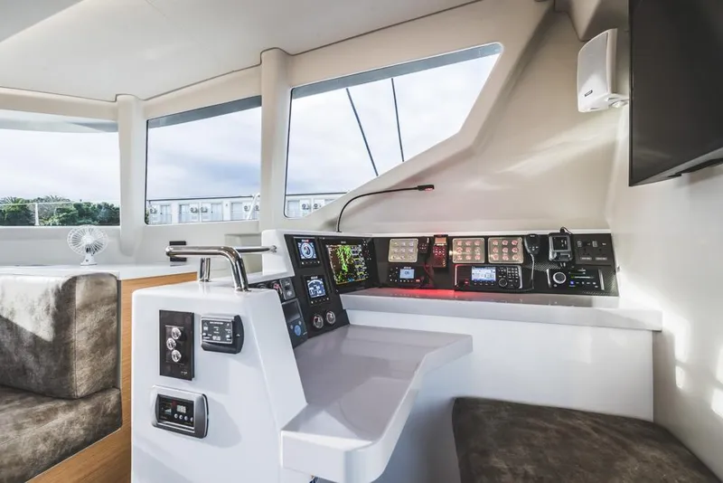 Slide: The Image of Modern Vision 444 yacht cockpit with advanced navigation controls, 2026 model. - 19