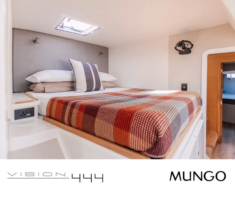 Slide: The Image of Cozy cabin interior of Vision 444 yacht, featuring a plaid bedspread and modern design, 2026 model. - 27