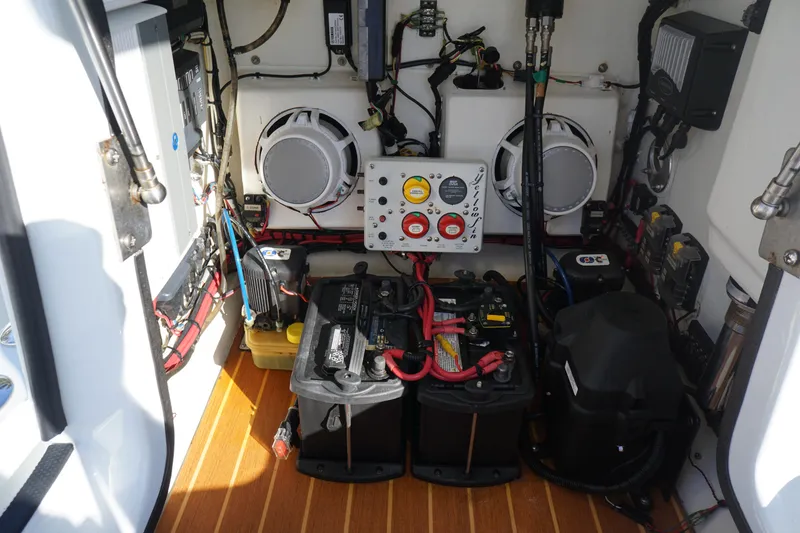 Slide: The Image of 2015 Yellowfin 24 Bay boat electrical system with batteries and wiring. - 16
