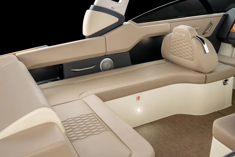 Slide: The Image of 2025 Chris-Craft Sportster 28 interior with beige leather seating and modern design. - 41