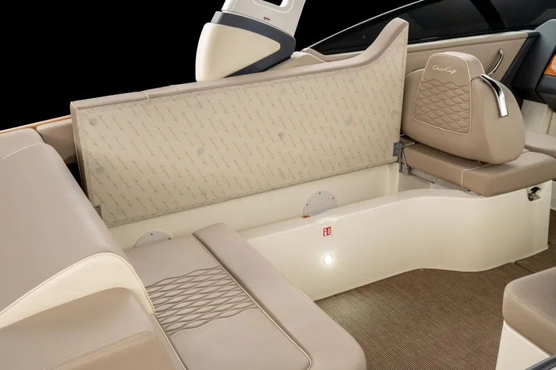 Slide: The Image of 2025 Chris-Craft Sportster 28 interior with beige leather seating and elegant design. - 43