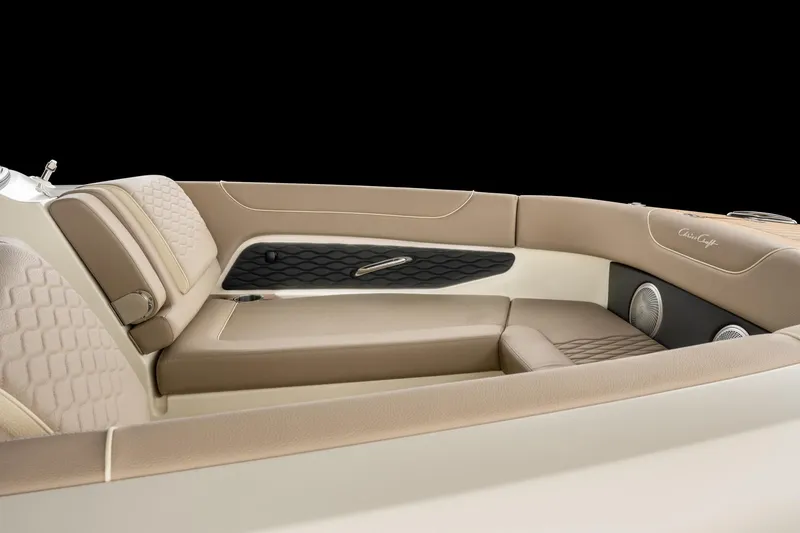 Slide: The Image of 2025 Chris-Craft Sportster 28 interior with beige leather seating and modern design. - 47