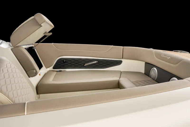 Slide: The Image of 2025 Chris-Craft Sportster 28 interior with beige leather seating and modern design. - 48