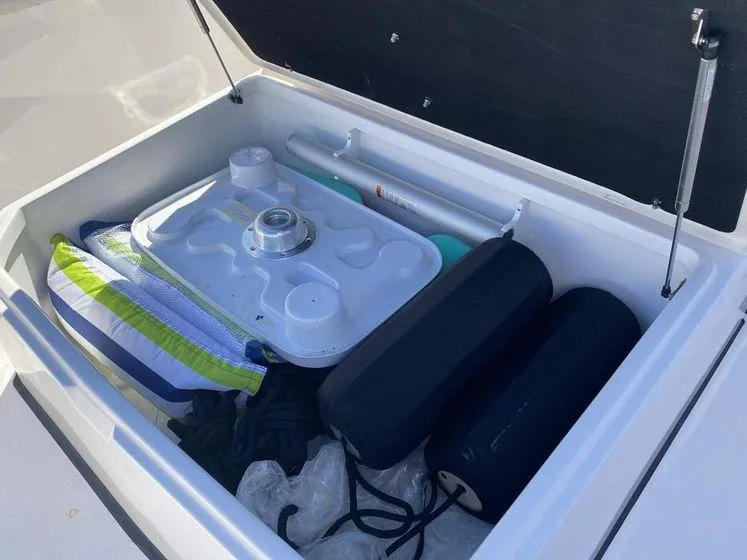 Slide: The Image of Storage compartment of 2022 Sea Fox 328 Commander with boating accessories. - 42