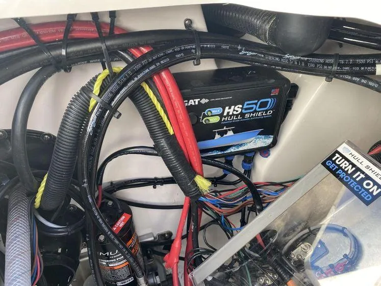 Slide: The Image of Engine compartment of a 2022 Sea Fox 328 Commander with wiring and Hull Shield system. - 43