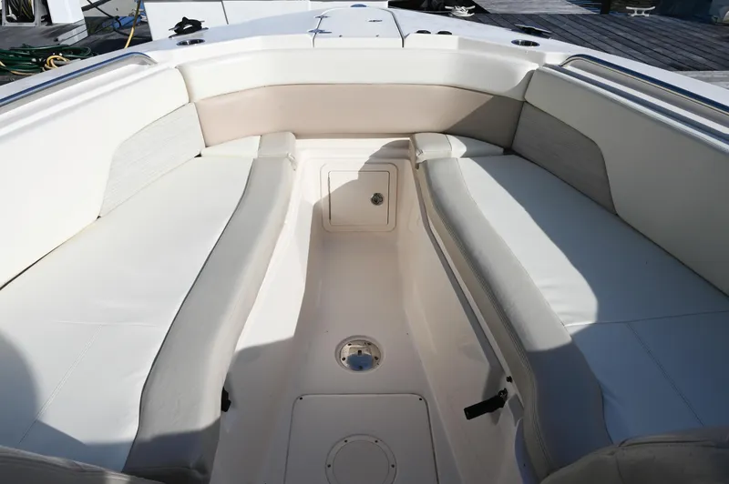 Slide: The Image of 2014 Grady-White Freedom 307 boat interior with spacious seating and storage. - 35