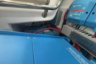 Slide: The Image of 2024 Axopar 37 XC Cross Cabin electrical system with blue components and wiring. - 15