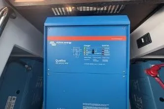 Slide: The Image of 2024 Axopar 37 XC Cross Cabin electrical system with Victron Energy Quattro inverter. - 17