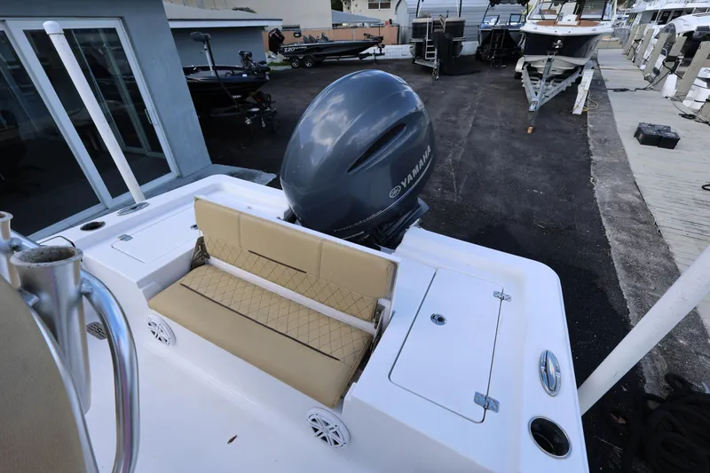 Slide: The Image of 2022 Sportsman Masters 207 Bay Boat with Yamaha engine, docked at marina. - 46