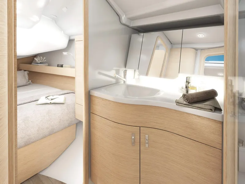 Slide: The Image of Luxurious interior of 2025 Dehler 38SQ yacht featuring modern bathroom and cozy bedroom. - 10