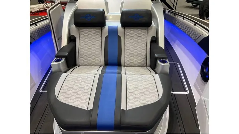 Slide: The Image of 2025 Fountain 43 SCX boat interior with luxurious seating and blue LED lighting. - 12