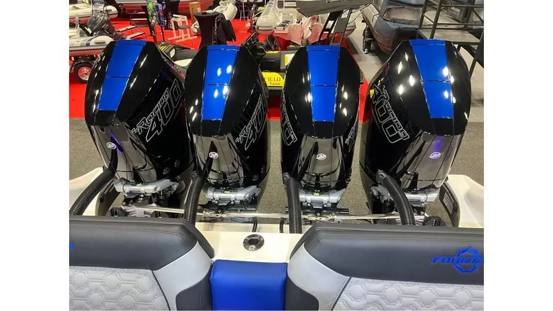 Slide: The Image of 2025 Fountain 43 SCX boat with four powerful outboard engines, showcased at a boat exhibition. - 16