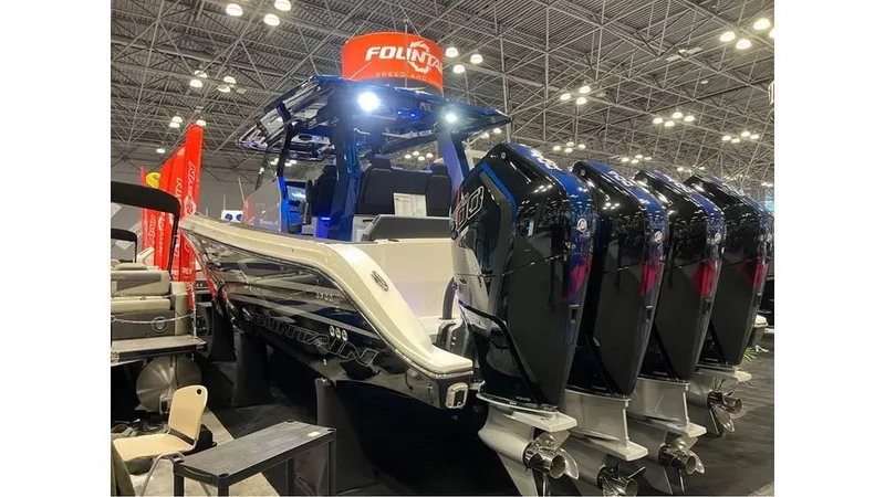 Slide: The Image of 2025 Fountain 43 SCX boat with multiple outboard engines displayed at an indoor exhibition. - 3