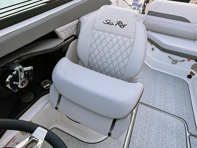 Slide: The Image of 2025 Sea Ray SLX 260 Outboard boat interior with luxurious seating and modern design. - 22