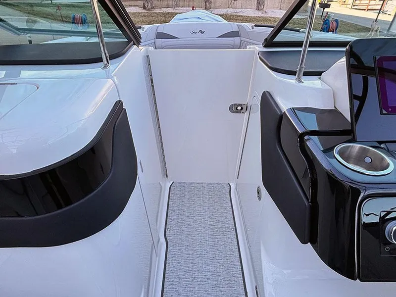 Slide: The Image of 2025 Sea Ray SLX 260 Outboard interior with sleek design and modern dashboard. - 28