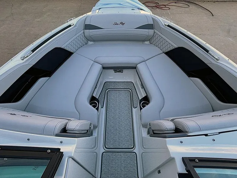 Slide: The Image of 2025 Sea Ray SLX 260 Outboard boat interior with luxurious seating and modern design. - 31