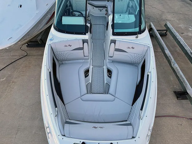 Slide: The Image of 2025 Sea Ray SLX 260 Outboard boat with spacious seating and modern design. - 37