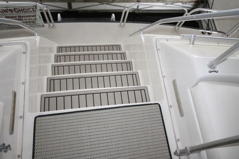 Slide: The Image of Steps leading to the deck of a 1989 Mainship 41 Grand Salon yacht. - 25