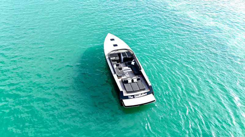 Slide: The Image of VanDutch 55 yacht from 2014 on clear turquoise water, aerial view. - 21