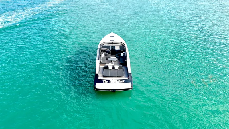Slide: The Image of VanDutch 55 yacht from 2014 on clear turquoise water, aerial view. - 30