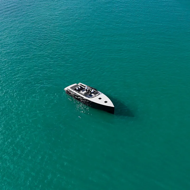 Slide: The Image of VanDutch 55 yacht from 2014 cruising on clear turquoise waters. - 40