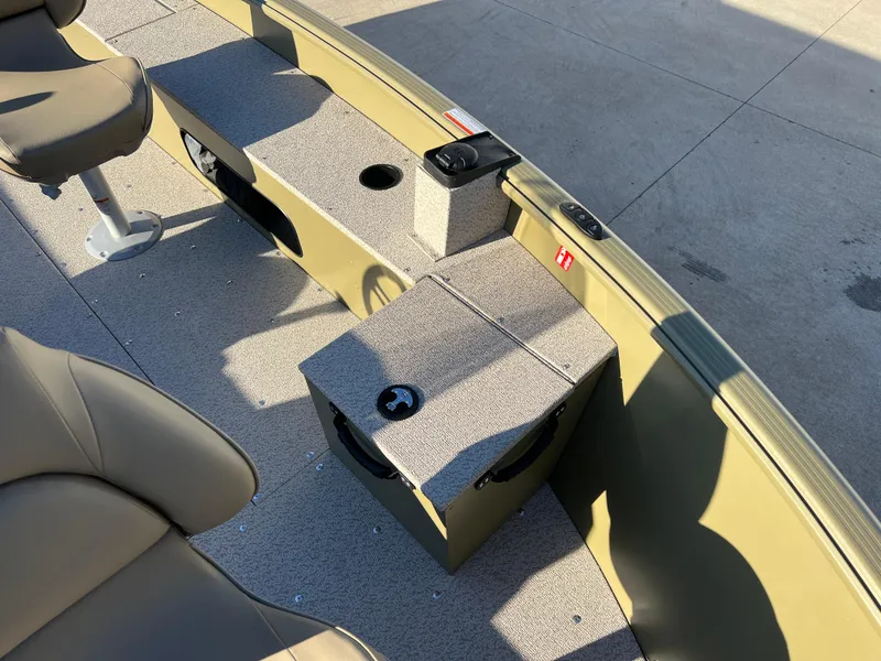 Slide: The Image of 2025 Lund 1875 Alaskan SS boat interior with seating and storage compartments. - 11