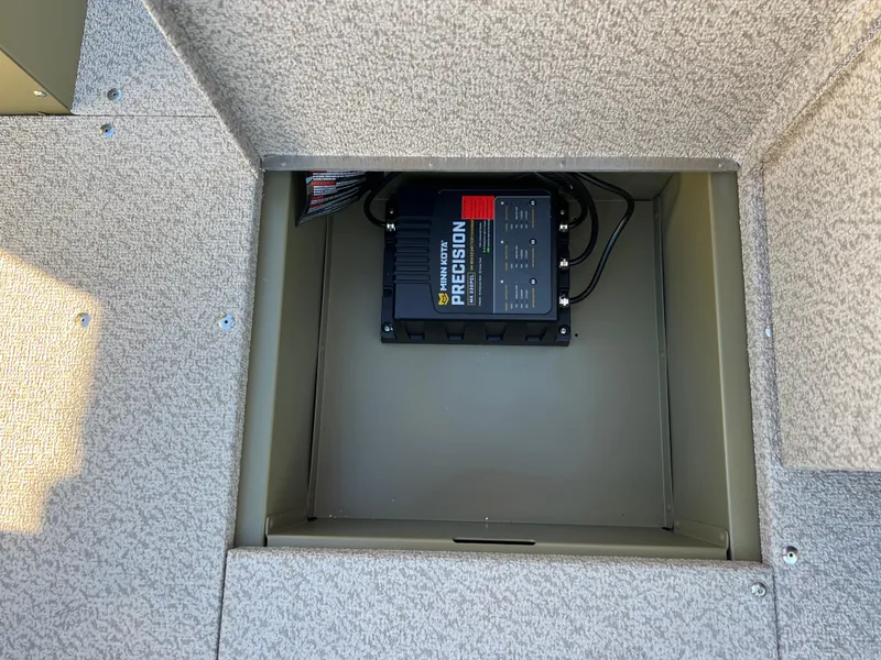 Slide: The Image of 2025 Lund 1875 Alaskan SS boat compartment with Precision battery charger. - 14
