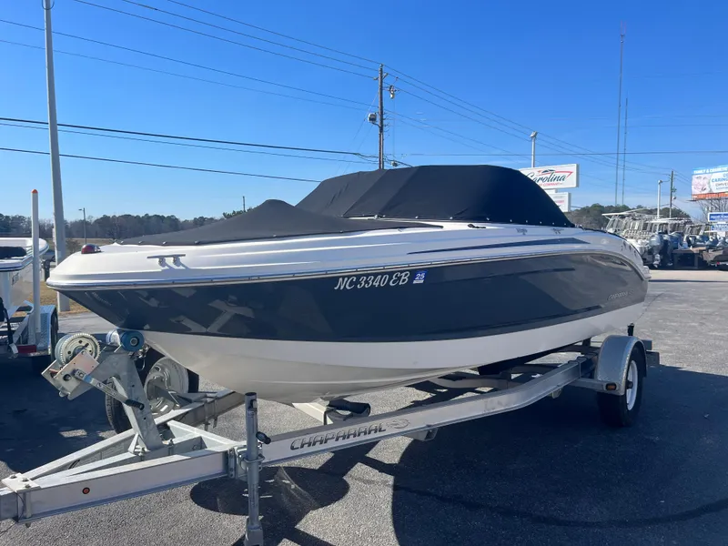 Slide: The Image of 2014 Chaparral 19 Sport H2O boat on trailer, covered, parked outdoors. - 4
