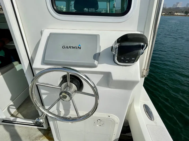 Slide: The Image of Steering console of 2012 Farallon 2800 Whaleback boat with Garmin navigation system. - 6