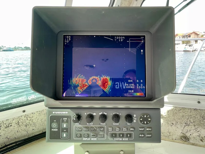 Slide: The Image of Farallon 2800 Whaleback 2012 boat with Furuno radar display, showing colorful sonar imaging. - 8