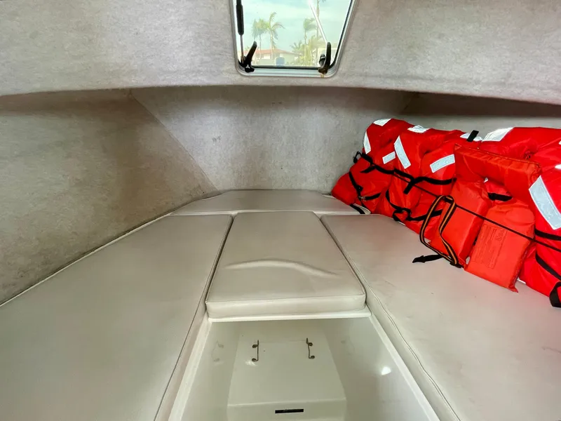 Slide: The Image of Interior of 2012 Farallon 2800 Whaleback boat with life jackets stored neatly. - 9