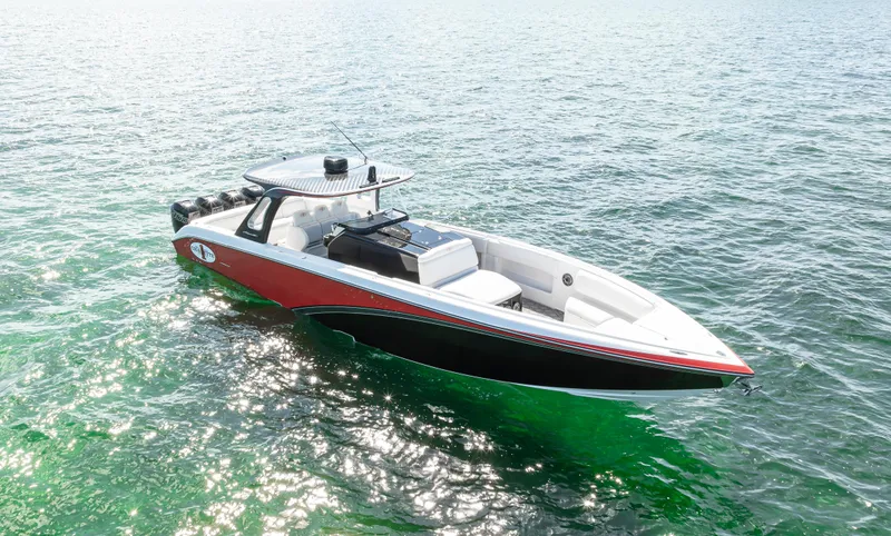 Slide: The Image of 2016 Cigarette 41 GTR boat on clear water, showcasing sleek design and vibrant colors. - 15